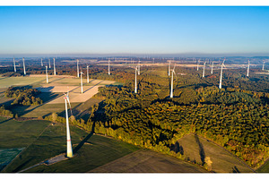 Aerial view of a wind farm in containing wind, turbine, and germany, an Industrial Photo by Leonid Andronov