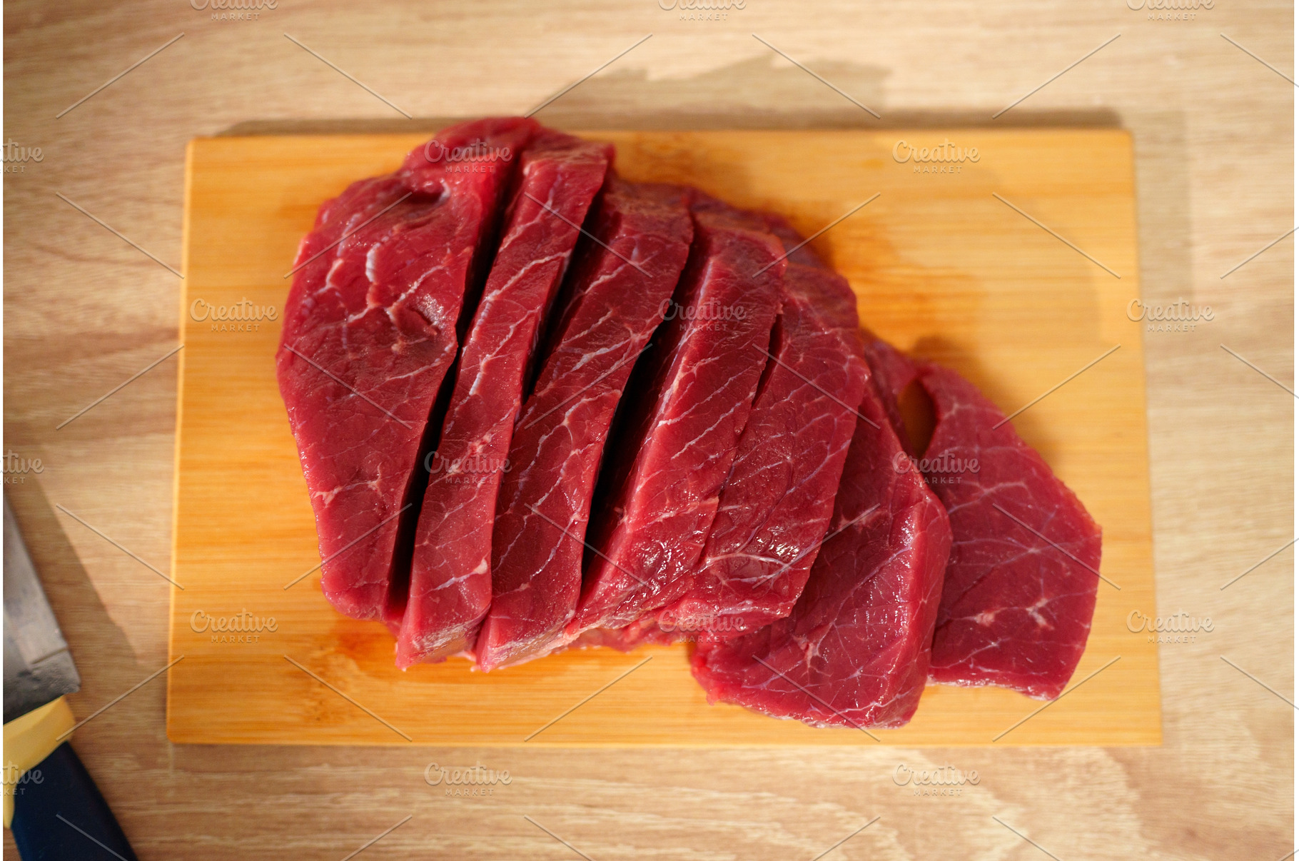 Freshly sliced red meat displayed on, a Food & Drink Photo by darksoul72