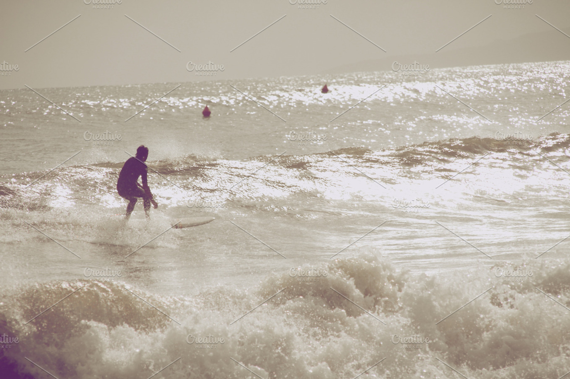 Surfing beach featuring beach, sun, and fun