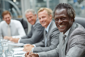 Team of professionals collaborating during a productive and engaging business m, a Photo by AS photostudio