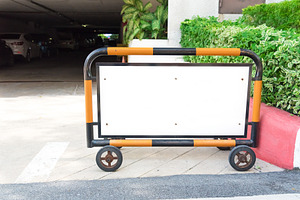 Blank parking sign in front of parking lots or garage. Traffic a