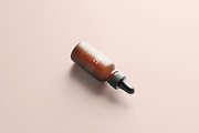 Frosted Glass Dropper Bottle Mockups, a Packaging Mockup by MockupFree.Net (Thumbnail 4 of 6)