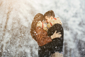 Happy couple in snow park stock photo containing amazing and snow