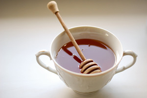 Honey in a white cup