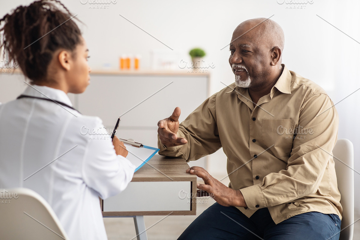 Black patient talking to doctor during appointment, a Photo by Prostock-Studio (Photo 2 of 2)