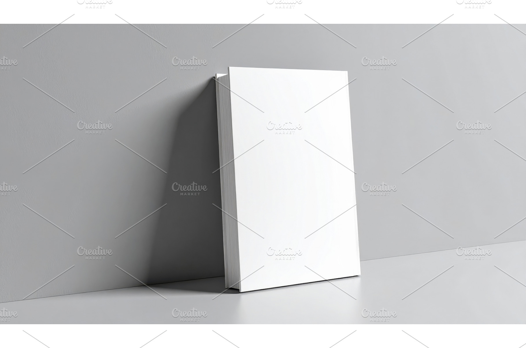 Blank white book cover leaning on, a Background Photo by Igor Tichonow
