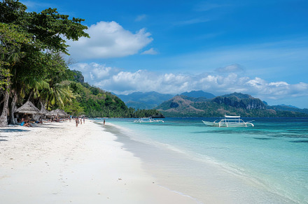 Sandy Beach With Clear Waters and Bo, a Photo by Tanuart