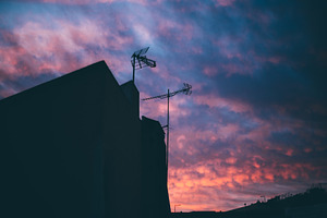 Rooftop antenna silhouette; dusk sky, an Architecture Photo by SkyNext