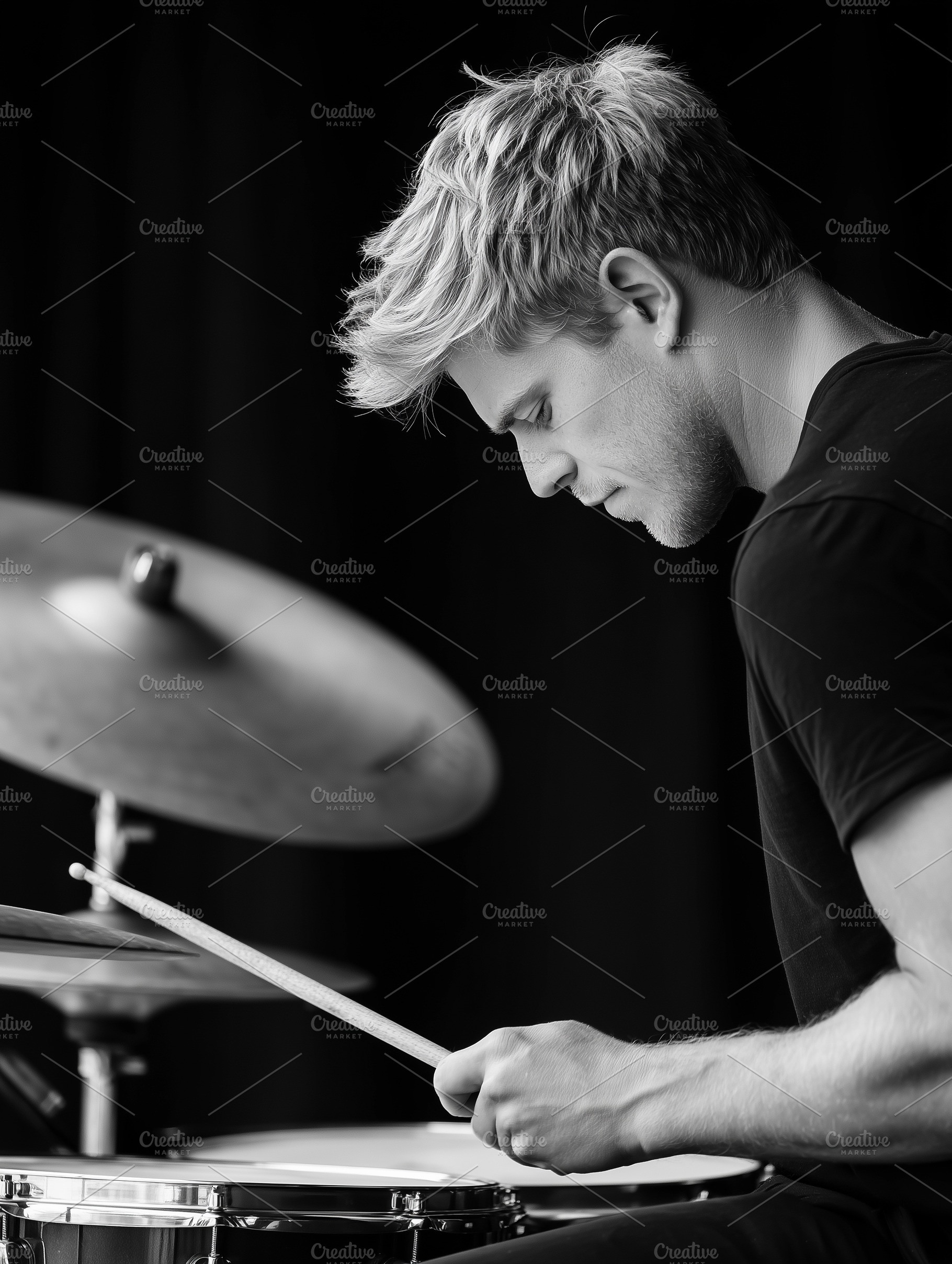 Focused young male drummer, an Arts & Entertainment Photo by MistyDay