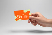 Hand Holding Business Card Mockup, an Advertising Mockup by Templeste (Thumbnail 1 of 3)