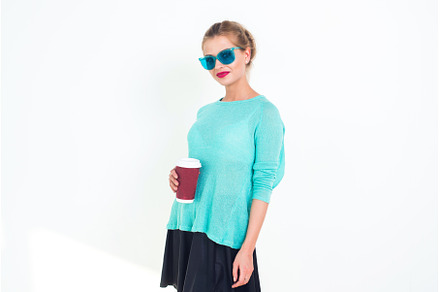 Woman wearing mint blue sunglasses, a Beauty & Fashion Photo by undrey