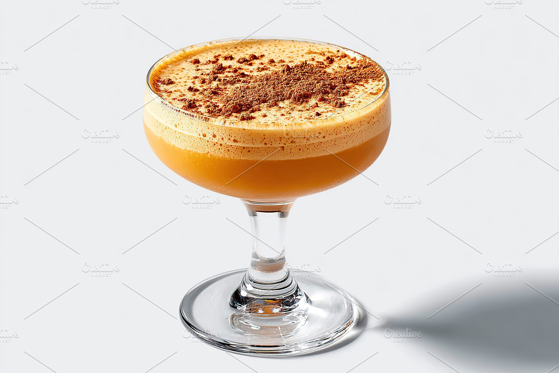 Delightful creamy cocktail served in a coupe glass with chocolate garnish at a, a Photo by AlyaAnd