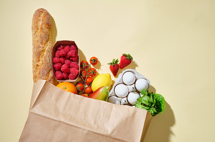 Full paper grocery bag with healthy products. Organic food conce, a Food & Drink Photo by Asya Nurullina