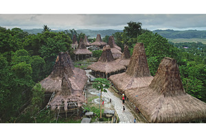 Traditional conical roof houses in, an Architecture Photo by Goinyk