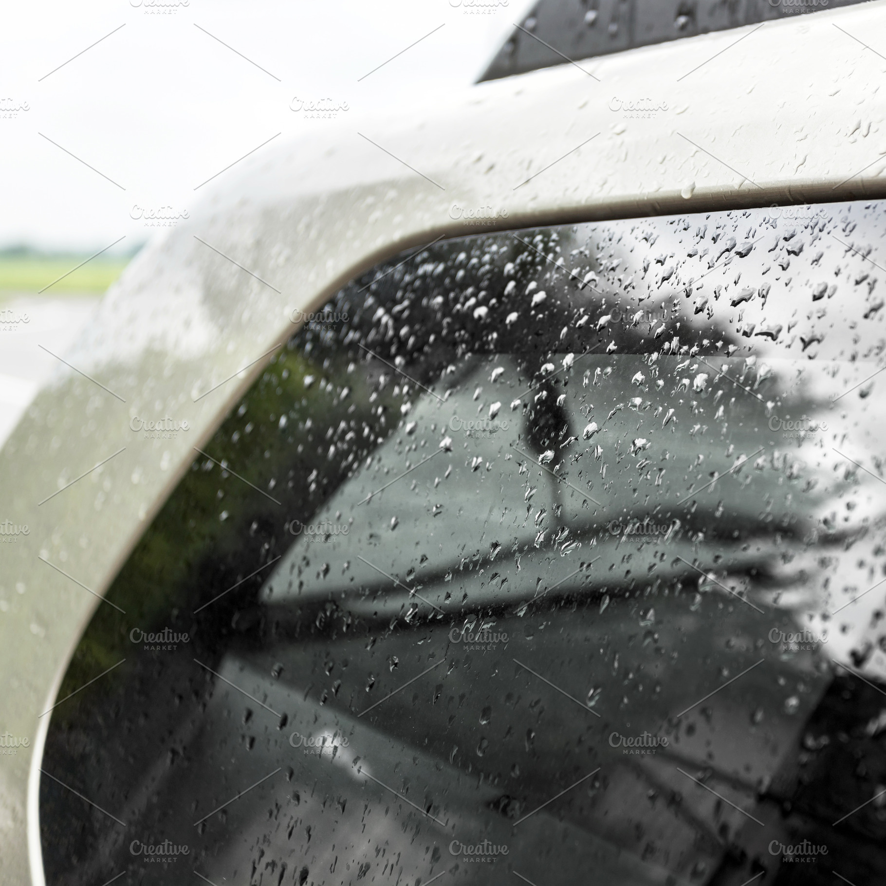 Raindrops on the car, a Transportation Photo by KYNA STUDIO