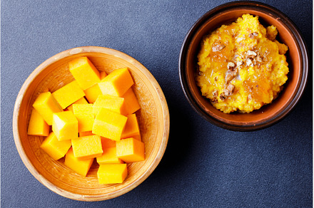 Sweet pumpkin porridge in clay bowl, a Food & Drink Photo by serkum