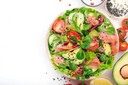 Spring salad with salted salmon, avocado, tomatoes, cucumber, bl, a Food & Drink Photo by 5PH