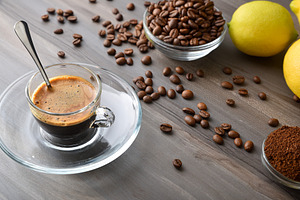 Coffee on wooden table with deco elevated view, a Food & Drink Photo by Davizro's Market