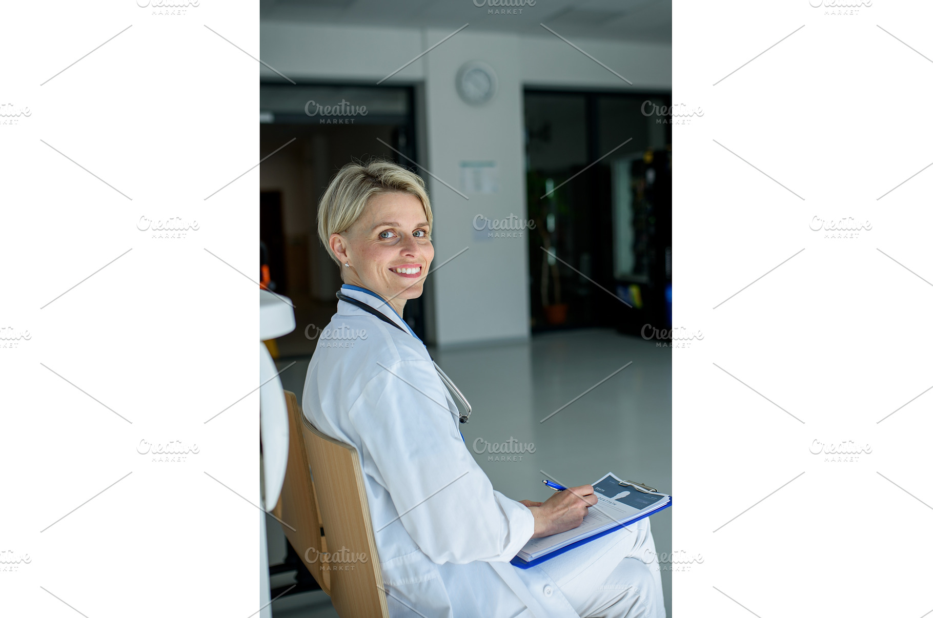 Young female doctor with short hair, a Person Photo by HalfPoint