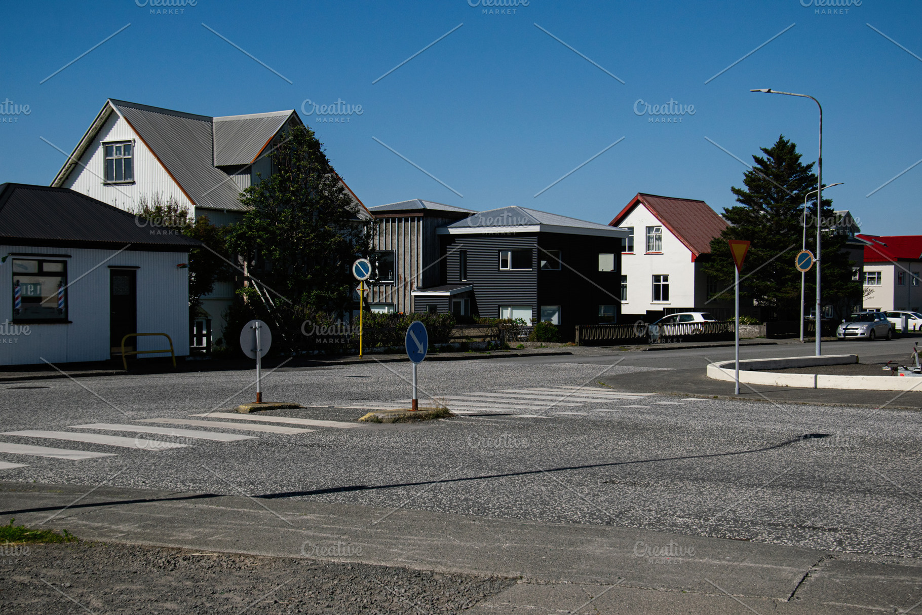 Quiet neighborhood street view in Akranes, Iceland with modern and traditional, a Photo by AS photostudio