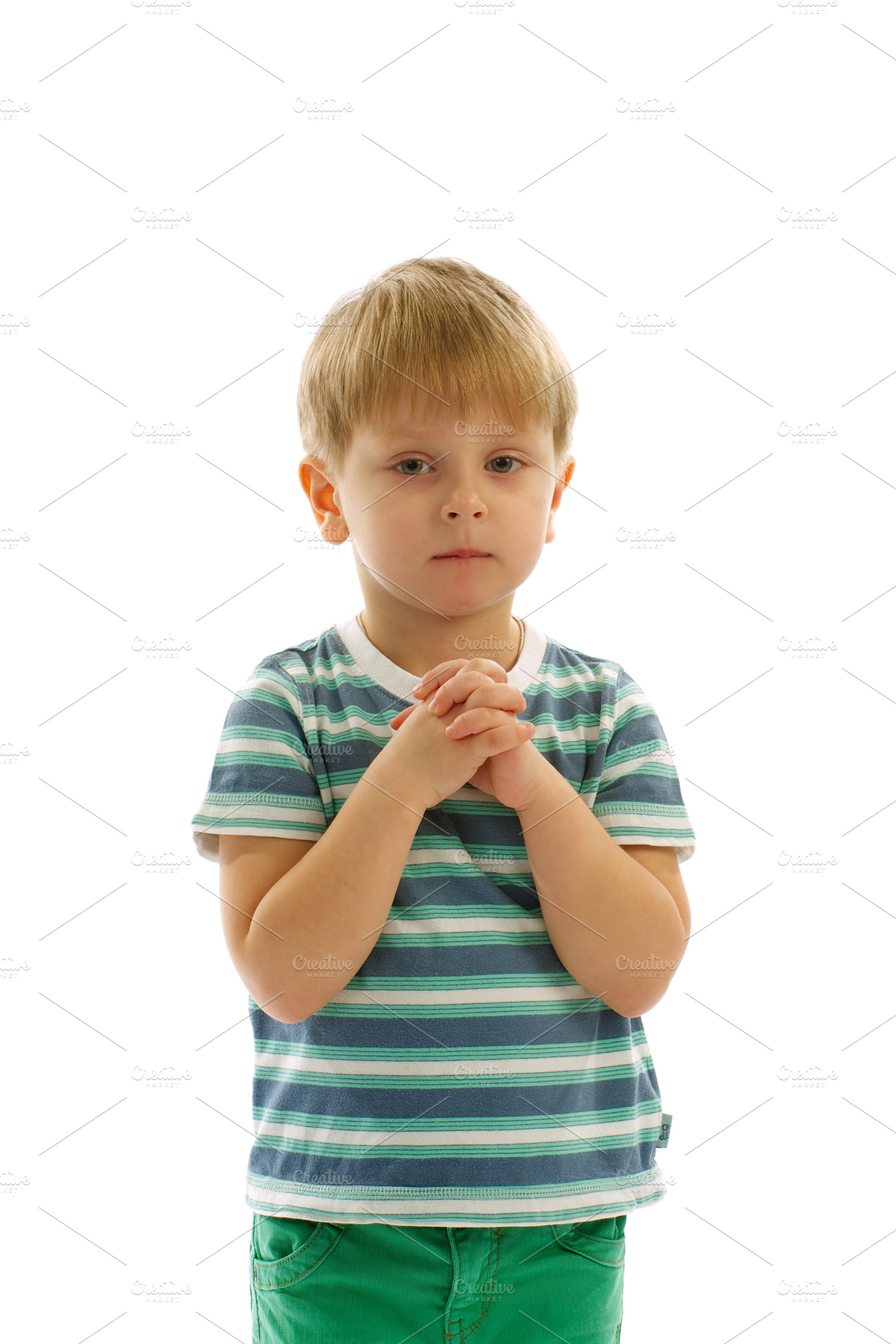 Little Boy Prayed, a Person Photo by zhekos
