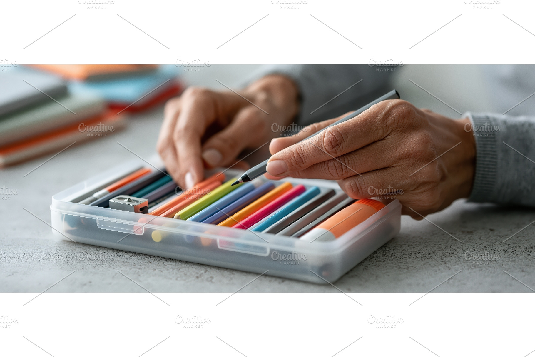 Hands Organizing Pen into Pencil, a School & Education Photo by piter.goskov