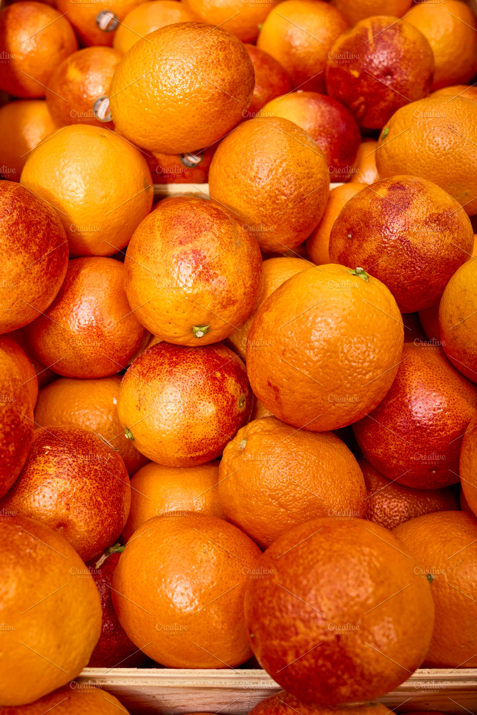 Fresh Blood Oranges in a Market Disp, a Photo by Photos from the Heart