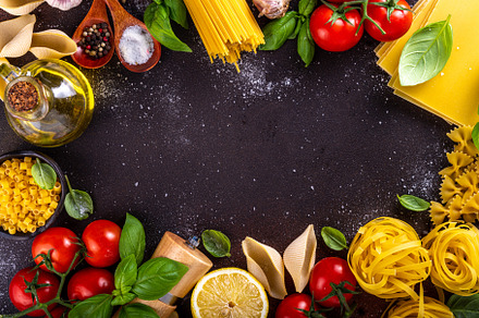 Various pasta with spices and ingredients for cooking, a Food & Drink Photo by Rimma