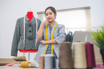 Fashion designer stylist in business owner workshop. Tailor and, a Person Photo by Ministocker