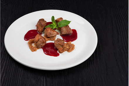 Pork meat with berries sauce, a Food & Drink Photo by Jan Jack Russo Media