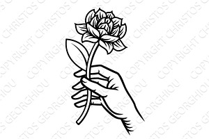 Hand Holding Flower Vintage Woodcut, an Object Illustration by Christos Georghiou