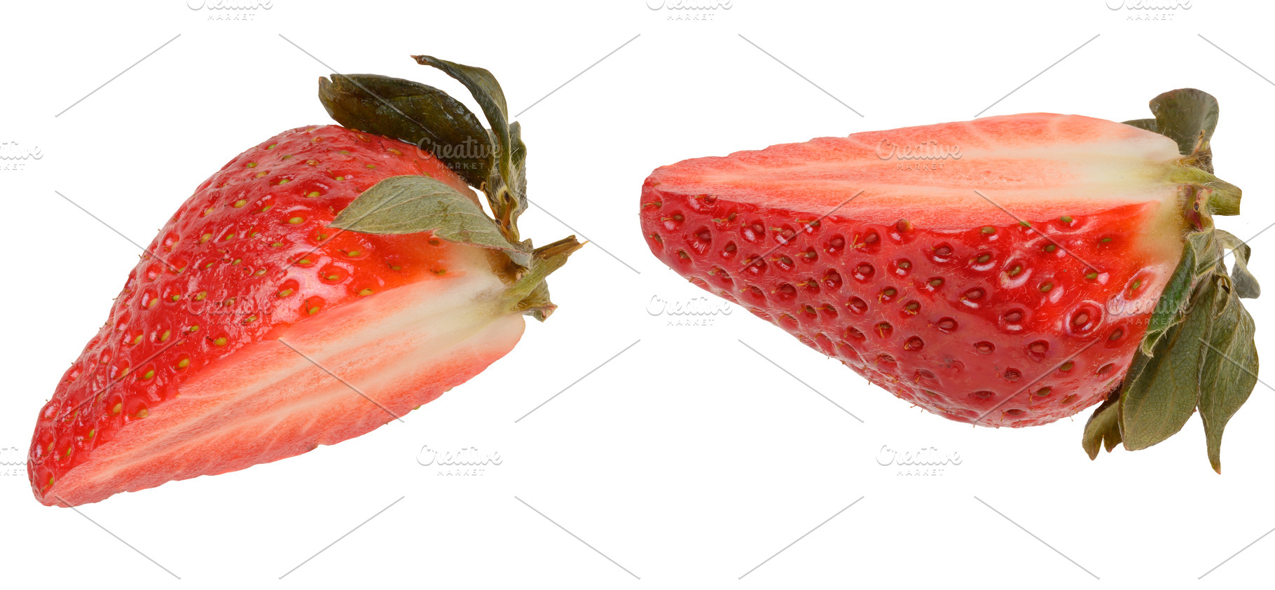 Halves of red ripe strawberries with green sepals on isolated ba, a Food & Drink Photo by ndanko