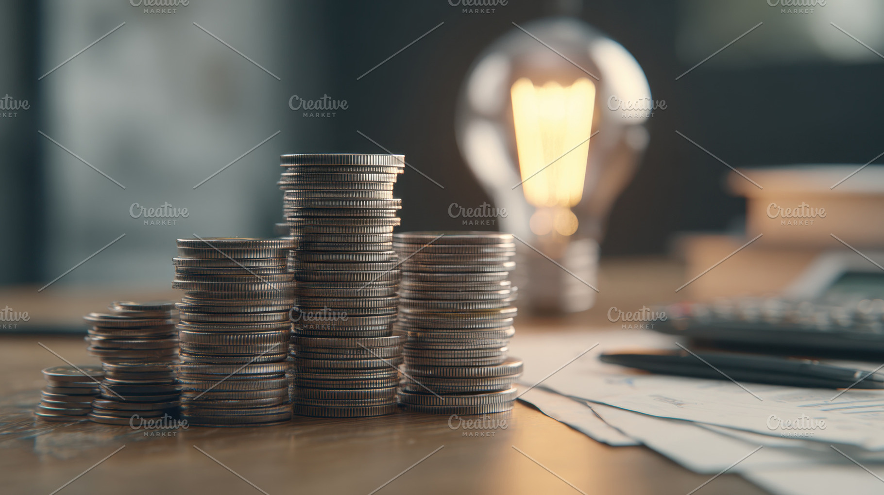 Stack of coins on wooden table, a Photo by Beautiful things