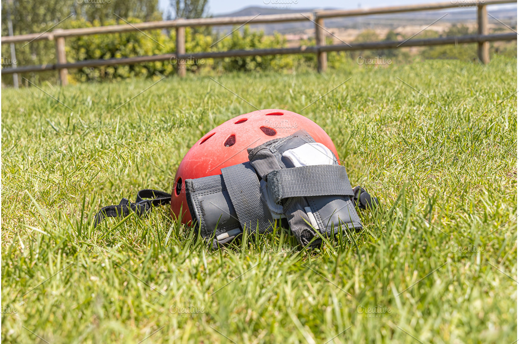 A red helmet and A gray wrist guard, a Technology Photo by Illustrations&photos