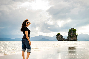 Young Woman Beach Walking, a Person Photo by THP Creative