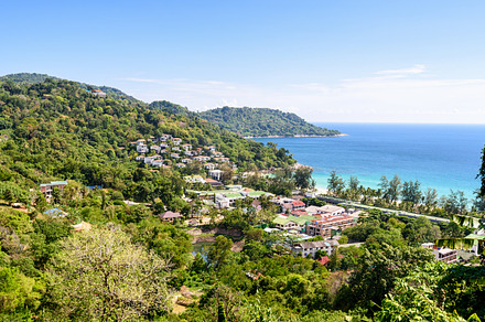 Woman on hat kata karon viewpoint featuring phuket, sea, and resorts, a Nature Photo by yongkiet jitwattanatam