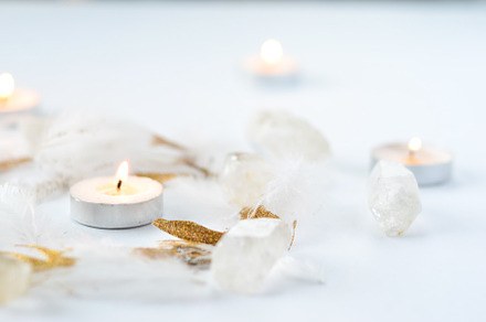 Quartz candles glitter feathers stock photo containing crystal and crystals, a Nature Photo by Coral Antler
