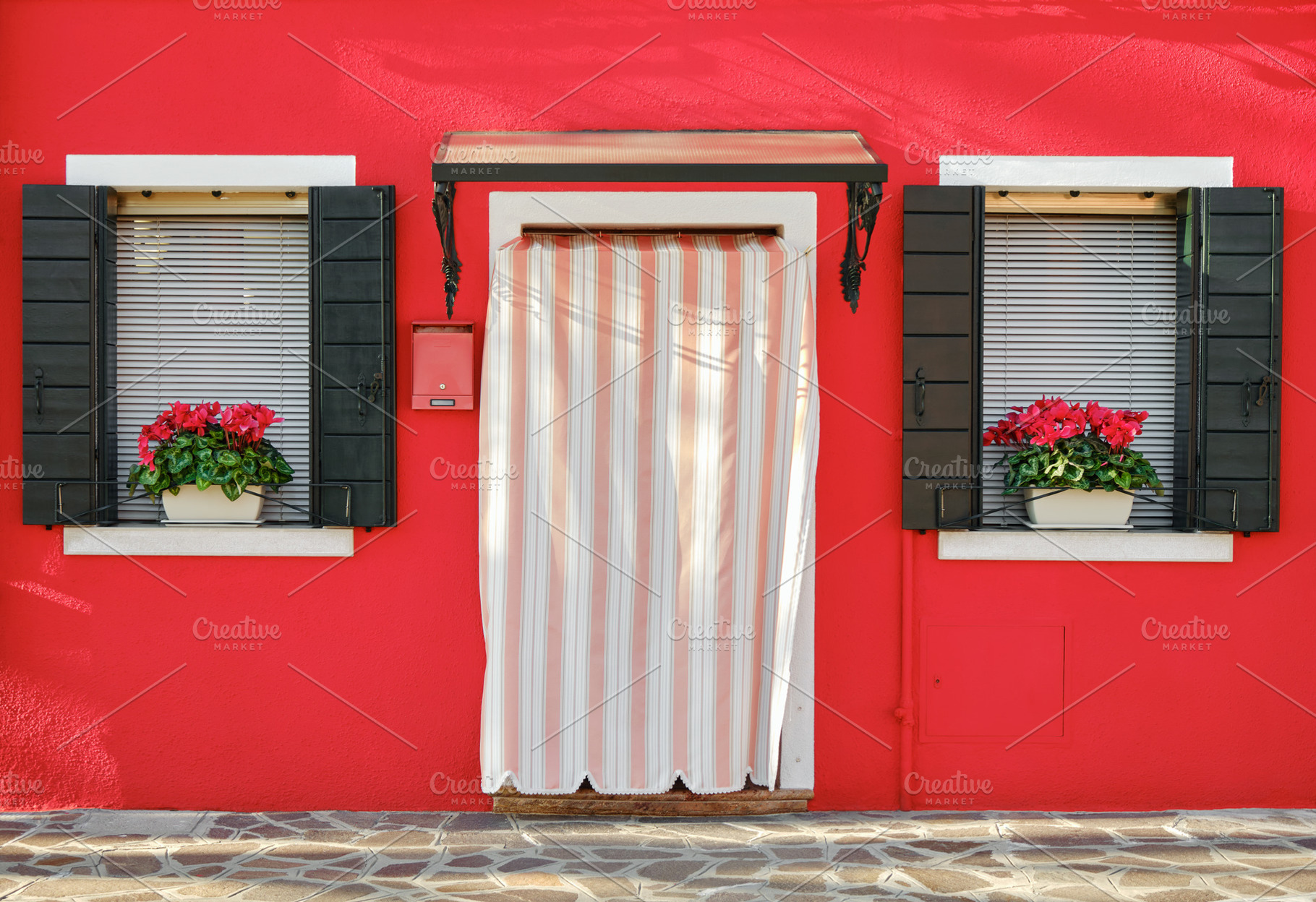 Colorful house entrance in Burano, an Architecture Photo by BOOCYS