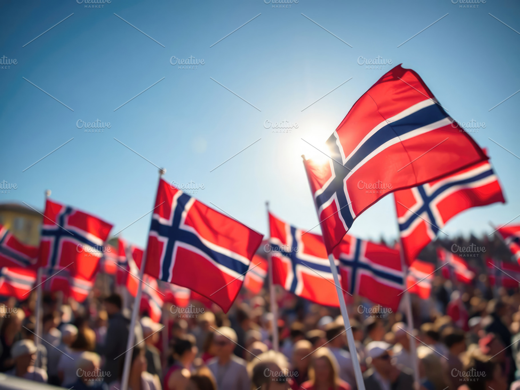 Norwegian flags fluttering energetically against bright sky, commemorating Nati, a Holiday Photo by Antonio Gravante Market