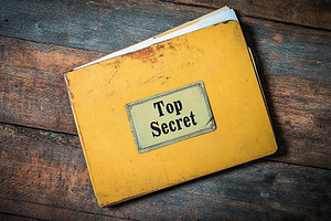 Yellow file with secret documents and Top Secret stamp, a Photo by AlyaAnd