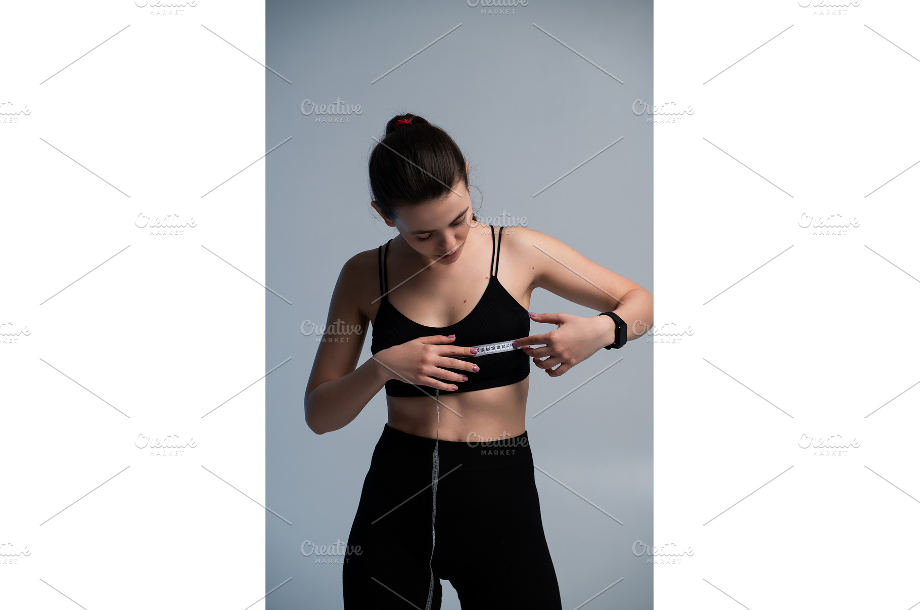 Woman measuring body, checking, a Sports & Recreation Photo by volodymyrshtun13795