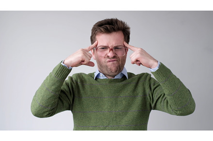 European young man holds his fingers, a Person Photo by Koldunova