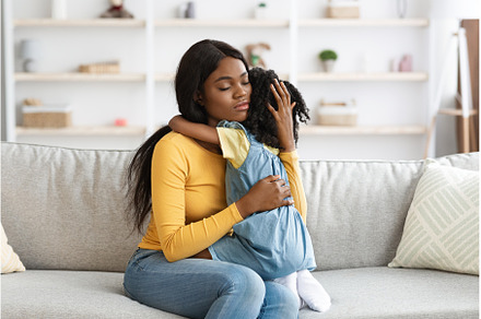 Caring African American Mom, a Person Photo by Prostock-Studio