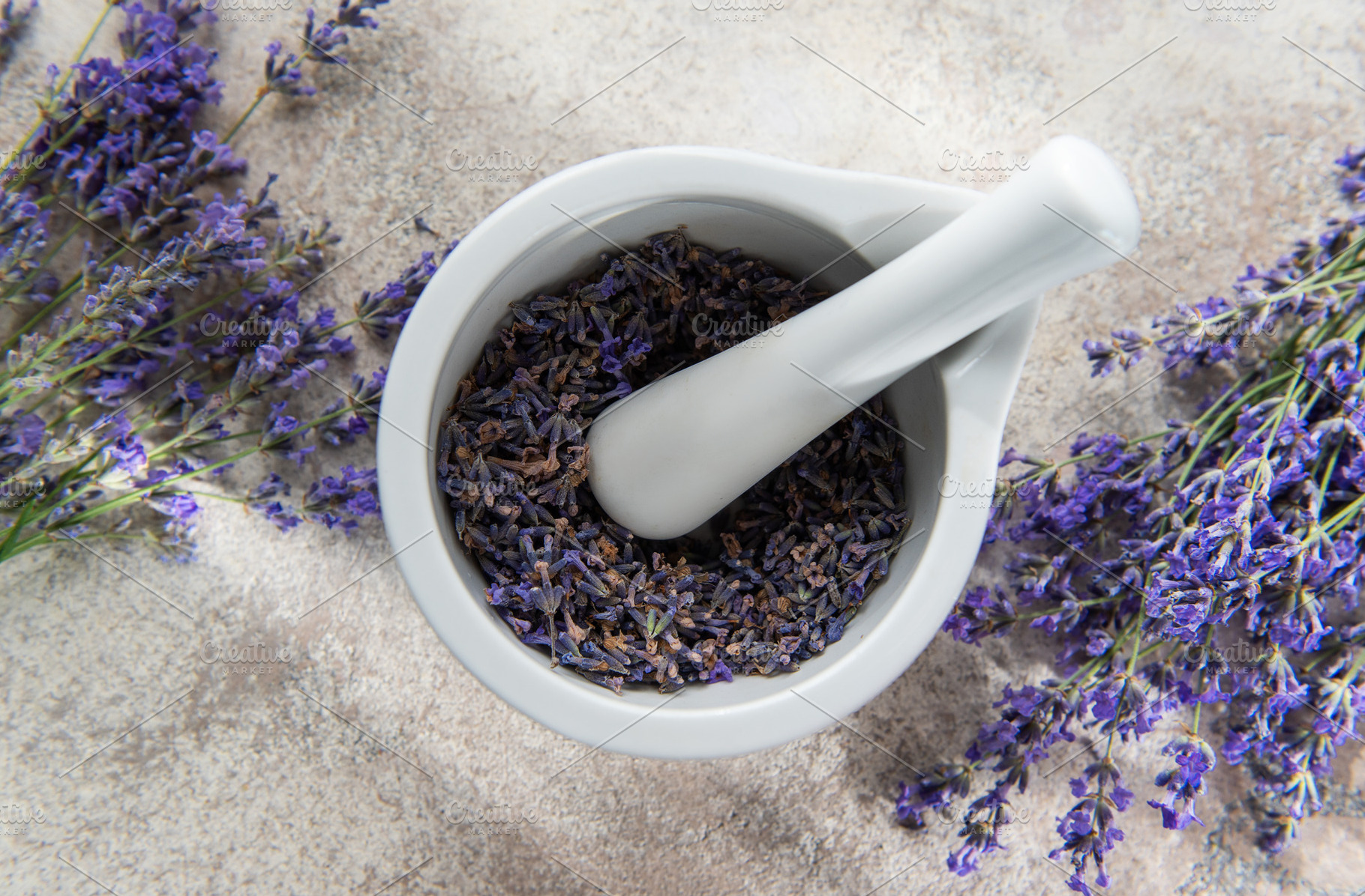 Lavender flowers and mortar with pestle for aromatherapy, a Health & Medical Photo by Olena Rudo
