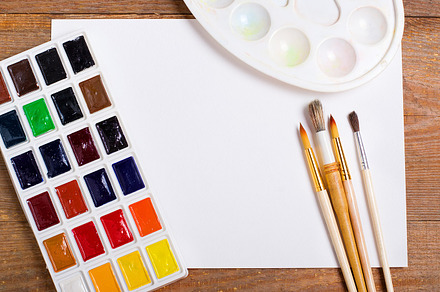 Paints brushes and album stock photo containing background and child