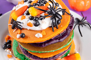 Colorful Halloween Pancakes with candy, pumpkin spider decoratio, a Food & Drink Photo by Rimma