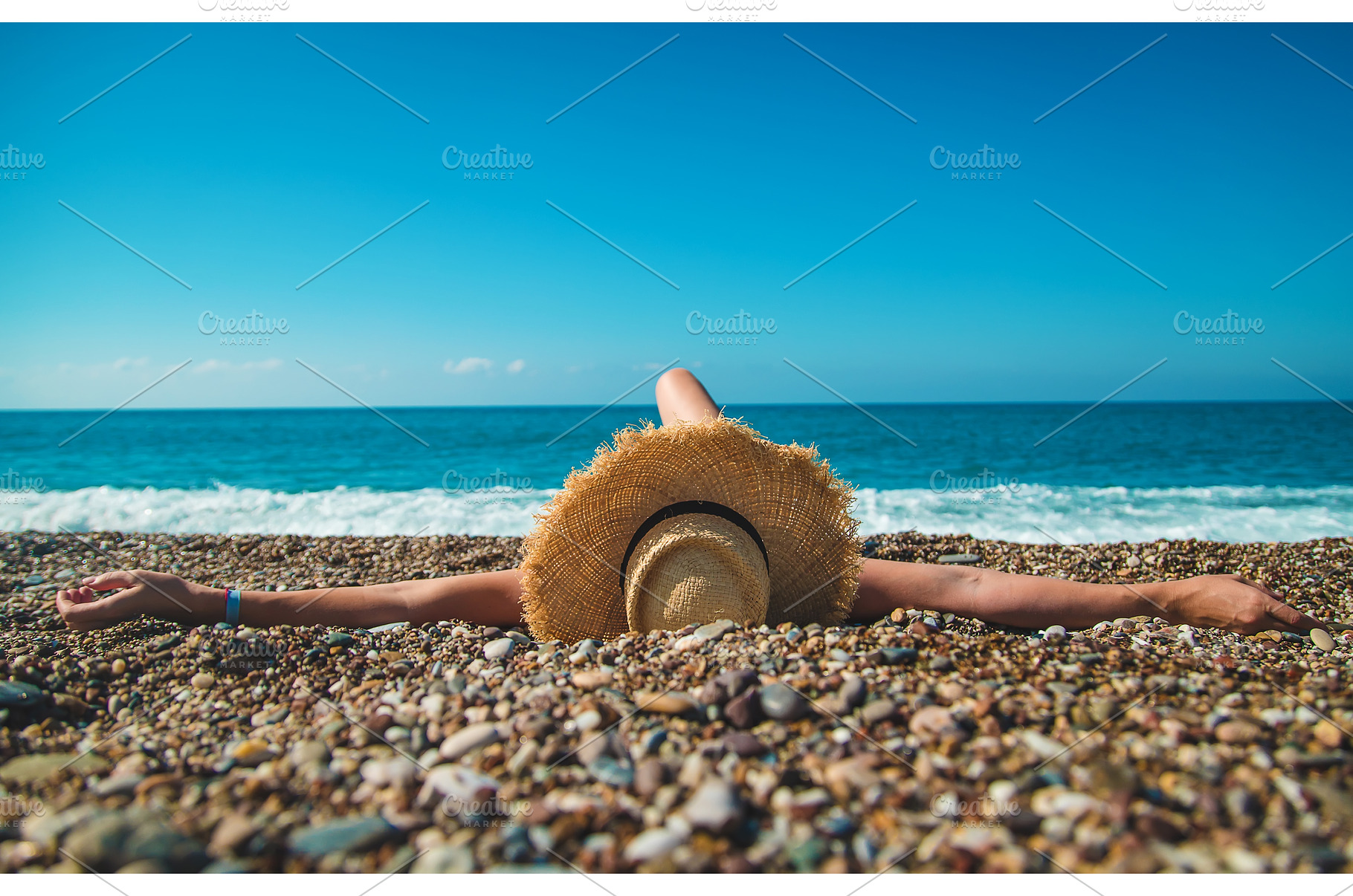 Woman at the sea in a hat. Selective, a Person Photo by yanadjana