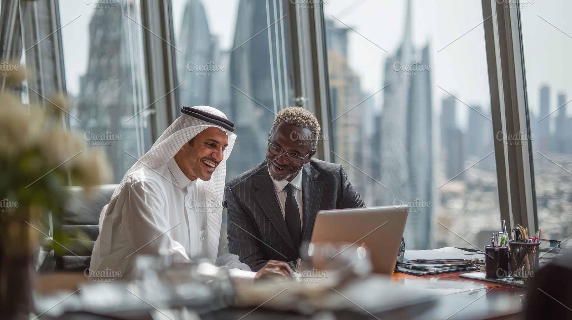 Businessmen collaborating on laptop, a Photo by Pixeness Studio