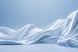 Blue wavy silk fabric creating elegant drapes and smooth ripples, a Photo by Studio ANNA