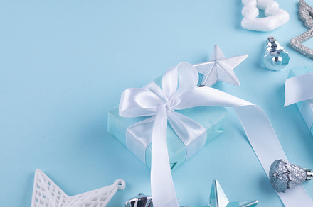 Christmas blue background. Holidays gift box wrapped in blue pap, a Holiday Photo by vimart